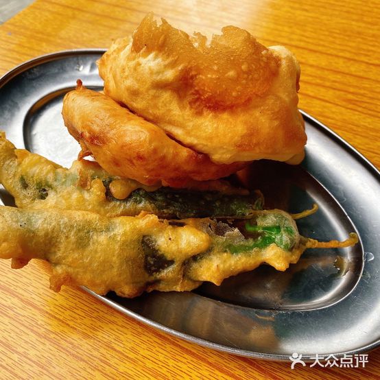 圣狮肥婆蚬粥店