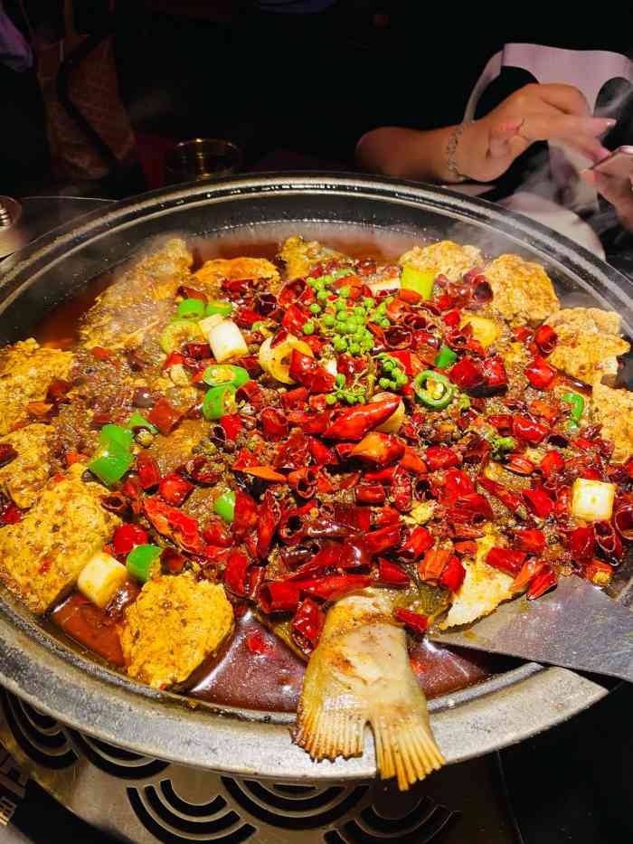 烤匠麻辣烤鱼(解放碑店)-"来重庆还是要安排一餐烤鱼的,朋友推荐的烤.