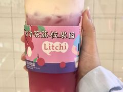 手舂荔枝奶缇-%百分茶(江阴万达店)
