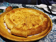 新疆土坑烤馕-巴扎美食·新疆菜·西域歌舞表演餐厅(新疆大厦店)