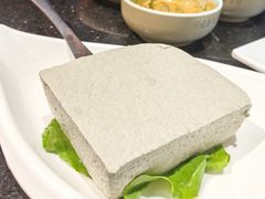 -明何记涮牛肚(品牌首店隋唐植物园南门古城路店)