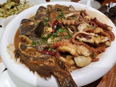 家焖杂拌鱼-日月昇海鲜码头(开发区五彩城店)