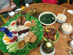 -沐毫傣泐云南菜孔雀宴•手抓饭傣味烧烤(曼听公园店)