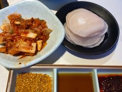 腌萝卜片-猪啊牛呀羊啊铜盘烤肉(正大广场店)