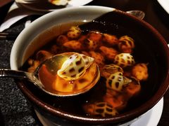 古越陈酿煮花螺-杭州西子湖四季酒店·金沙厅