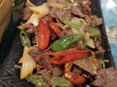 酸木瓜炒牛肉-紫滇源云南生态菜(丹凤街店)