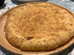 馕坑芝麻馕-巴扎美食·新疆菜·西域歌舞表演餐厅(新疆大厦店)