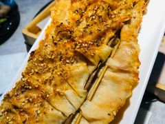 烤豆皮-锦州烧烤·纸包鱼(物资学院路店)
