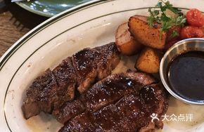Charcoal-Grilled American Grain-Fed 180-Day Ribeye Steak