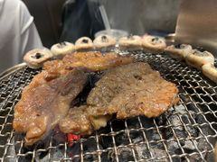 秘制牛小排-草家酱蟹炭火烤肉店(珲春南路一店)