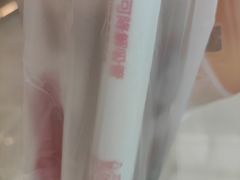 -蜜雪冰城(万达广场外B号门门口外集装箱店)