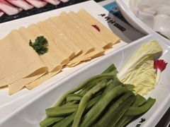 -老牌坊云南鱼豆花火锅(哈西万达店)