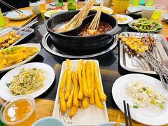 -明何记涮牛肚(品牌首店隋唐植物园南门古城路店)