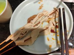 -明何记涮牛肚(品牌首店隋唐植物园南门古城路店)