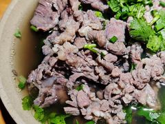 翘脚牛肉-大众跷脚牛肉馆·非遗传承单位(峨眉山店)