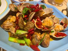 辣炒蚬子-街角等你.大连海鲜烧烤.经典铁板海鲜串(西安路店)