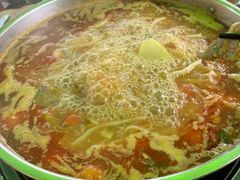 -黄利砖万峰林布依特色酸笋牛肉馆