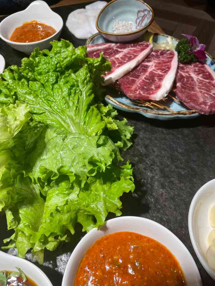 宣吉炭火烤肉(新华广场店"这个店有年头了,虽然现在改名字了.但是.