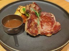 澳洲谷饲带骨肉眼牛扒-候鸟等风来·精致西厨(万科第五城店)