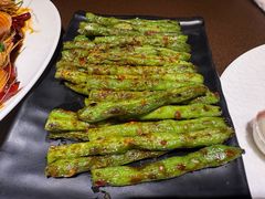 -曼听小寨海鲜烧烤·大连辣炒大王(盖州街店)