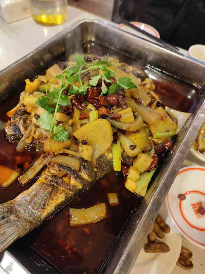 沈姐万州烤鱼(七中店)-"很多年前来吃过沈姐.很久没吃烤鱼了,想着.