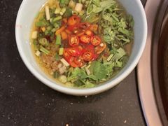 -明何记涮牛肚(品牌首店隋唐植物园南门古城路店)