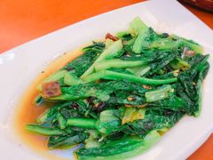 豆鼓鲮鱼炒油麦菜-巨元河鲜酒楼·清远特色菜名店(英德店)