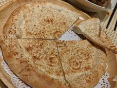 新疆土坑烤馕-巴扎美食·新疆菜·西域歌舞表演餐厅(新疆大厦店)