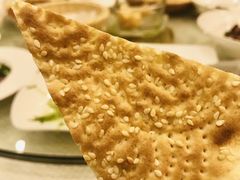 馕坑芝麻馕-巴扎美食·新疆菜·西域歌舞表演餐厅(新疆大厦店)