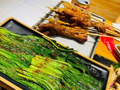 烤韭菜-串掌柜·炭火烤肉撸串专营店(盛世俪园店)