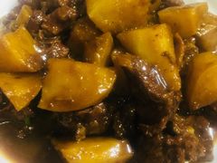 土豆烧牛腩-华春餐馆(鱼山路店)