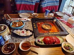 -老牌坊云南鱼豆花火锅(哈西万达店)