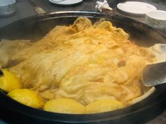 粘卷子-屯老二农家铁锅炖·行业领军者(梅江店)