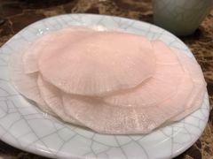 腌萝卜片-猪啊牛呀羊啊铜盘烤肉(正大广场店)