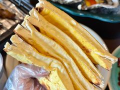 -曼听小寨海鲜烧烤·大连辣炒大王(盖州街店)