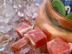 -毛辣果·贵州红酸汤牛肉火锅(西单店)