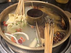 -明何记涮牛肚(品牌首店隋唐植物园南门古城路店)