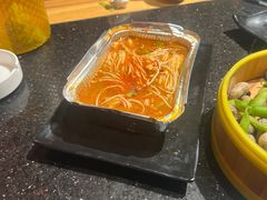-明何记涮牛肚(品牌首店隋唐植物园南门古城路店)