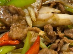 葱爆羊羔肉-巴扎美食·新疆菜·西域歌舞表演餐厅(新疆大厦店)