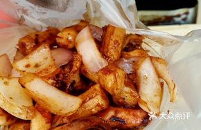 Signature Fragrant Stir-fried Squid with Rice Cakes
