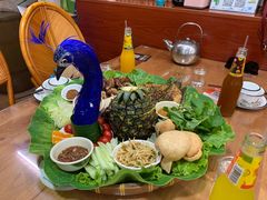 -沐毫傣泐云南菜孔雀宴•手抓饭傣味烧烤(曼听公园店)