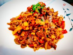 酸萝卜炒牛肉-祥云精致湘菜馆(东1时区店)