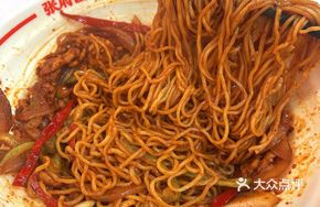 Fried Pork with Vegetables over Noodles