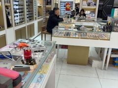 -美式眼镜·授权蔡司.依视路.尼康.豪雅.明月(人民广场店)