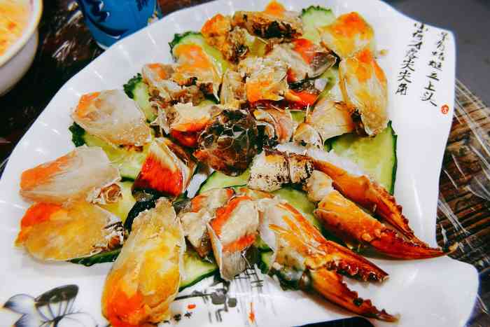 官塘锋记鱼生(牌坊街店)-"鱼生真的蛮特别,切成薄片码在篾篓盘上,晶.