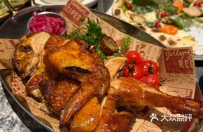 Herb-Roasted Chicken with Caramelized Onions, Potatoes and Organic Tomatoes
