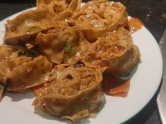 -明何记涮牛肚(品牌首店隋唐植物园南门古城路店)