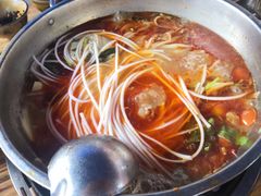 -黄利砖万峰林布依特色酸笋牛肉馆