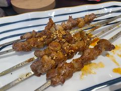 炭烤原味羊肉串-许哥东北烧烤·铁丳烤串·宫后夹肉(繁花中心店)