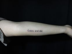 文字-木子·纹身店TATTOO穿孔·洗纹身